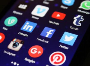 pexels photo 267350 267350 Close-up of a smartphone screen showing various social media app icons such as Facebook and Twitter.